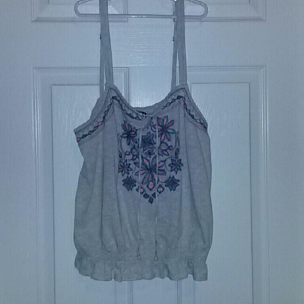 FREE with any $15 purchase American Eagle tank (banded waist)